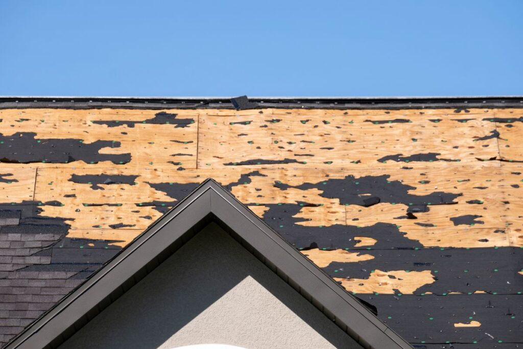 How much hail damage for insurance cover to replace a roof